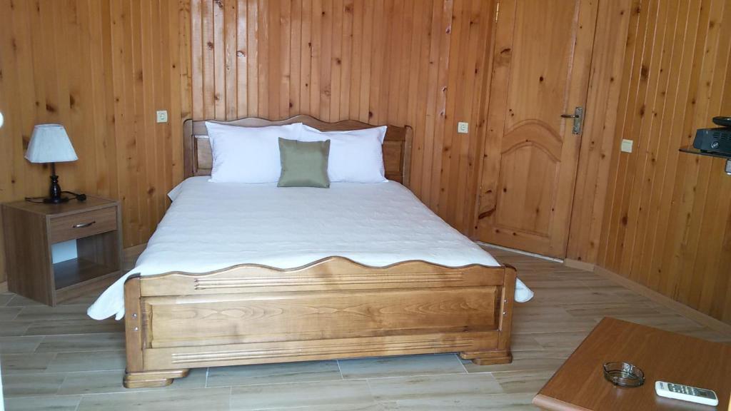 מיטה או מיטות בחדר ב-Villa Ureki