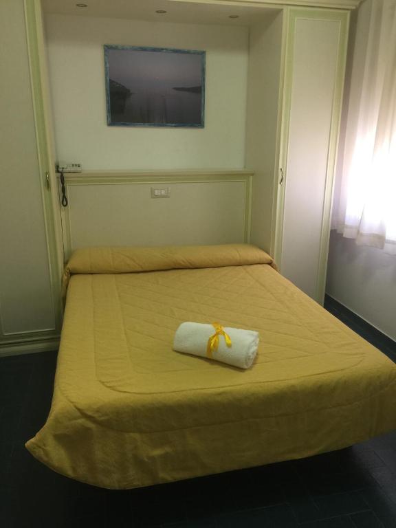 Postel nebo postele na pokoji v ubytování Hotel Due Torri