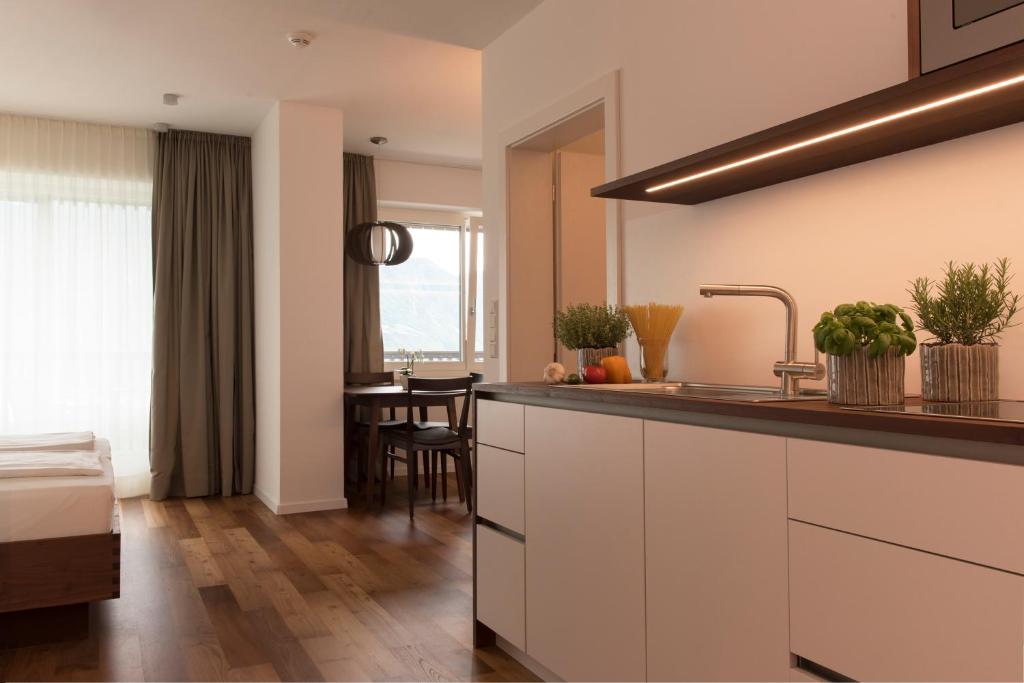 Kuchyň nebo kuchyňský kout v ubytování Apparthotel Calma
