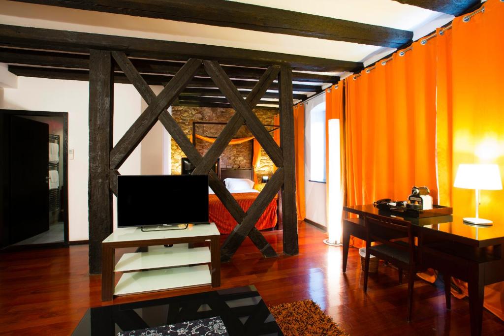 Posezení v ubytování Le B. Suites, Chambres & Restaurant