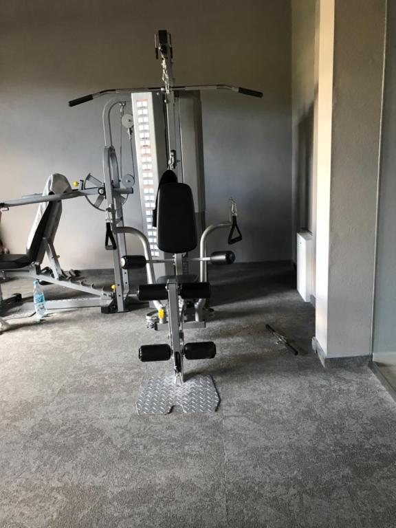 Posilňovňa alebo fitness centrum v ubytovaní OMI Apartments