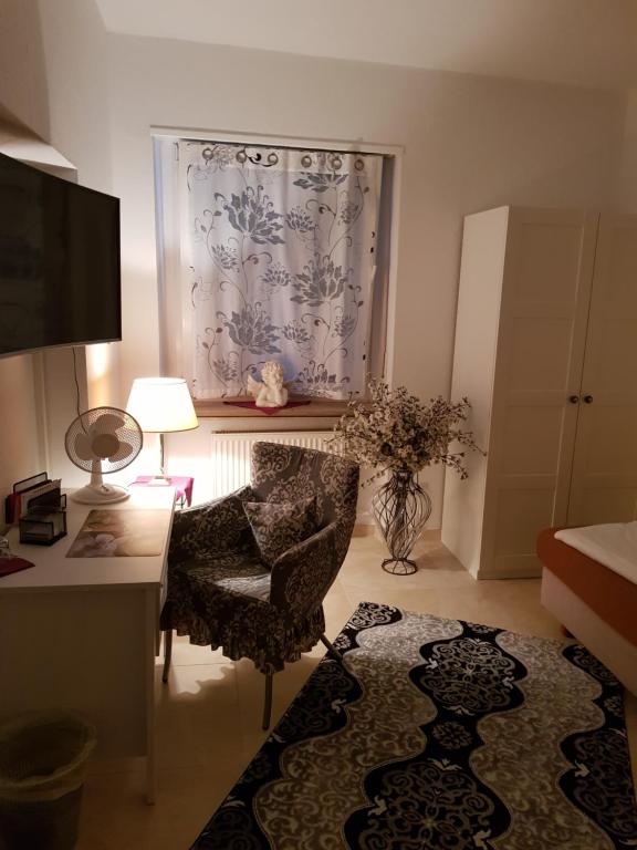TV a/nebo společenská místnost v ubytování Hotel Schweizer Stubb