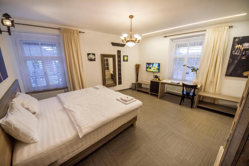 Postel nebo postele na pokoji v ubytování OH Apartments & Rooms