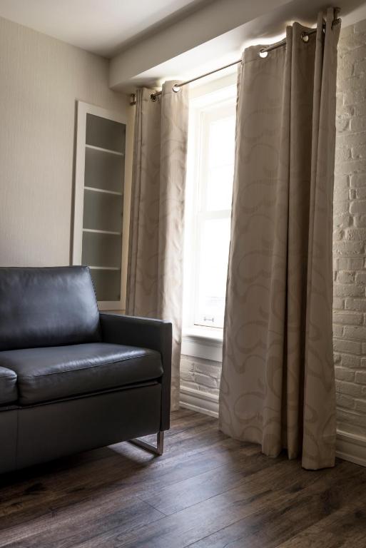 Posezení v ubytování Auberge du Trésor