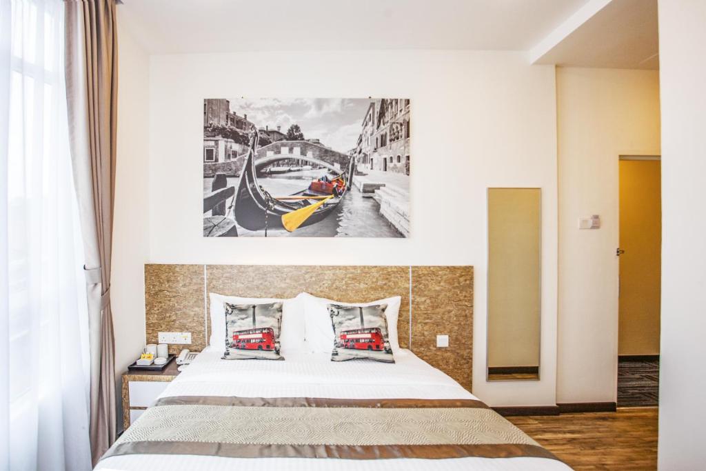 Postel nebo postele na pokoji v ubytování Natura Hotel