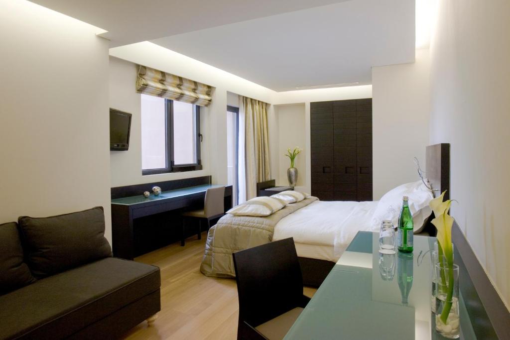 Posteľ alebo postele v izbe v ubytovaní O&B Athens Boutique Hotel