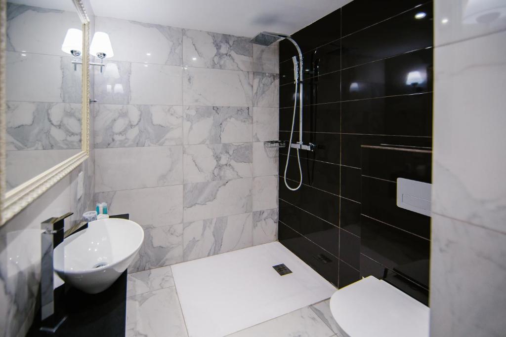 Koupelna v ubytování Qbic City Hotel