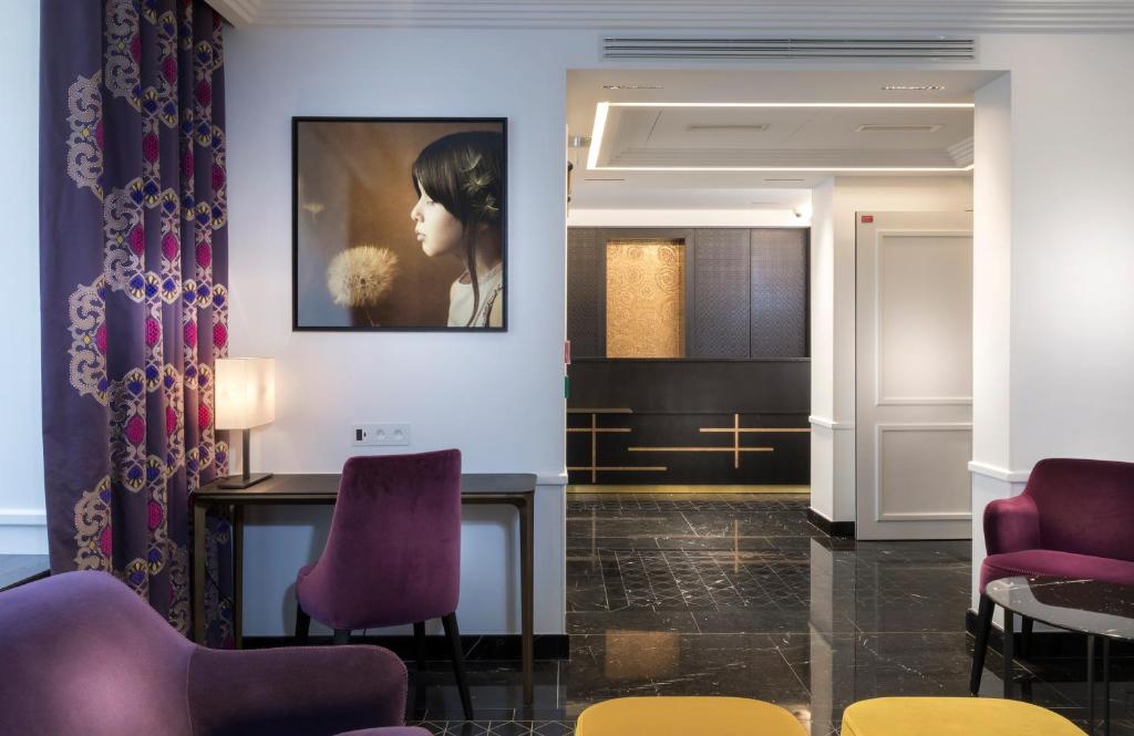 Χώρος καθιστικού στο Vendôme Opera Hotel