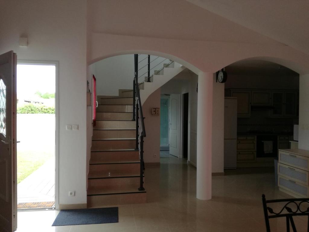 a view of a staircase in a house at Maison Matha in La Cotinière