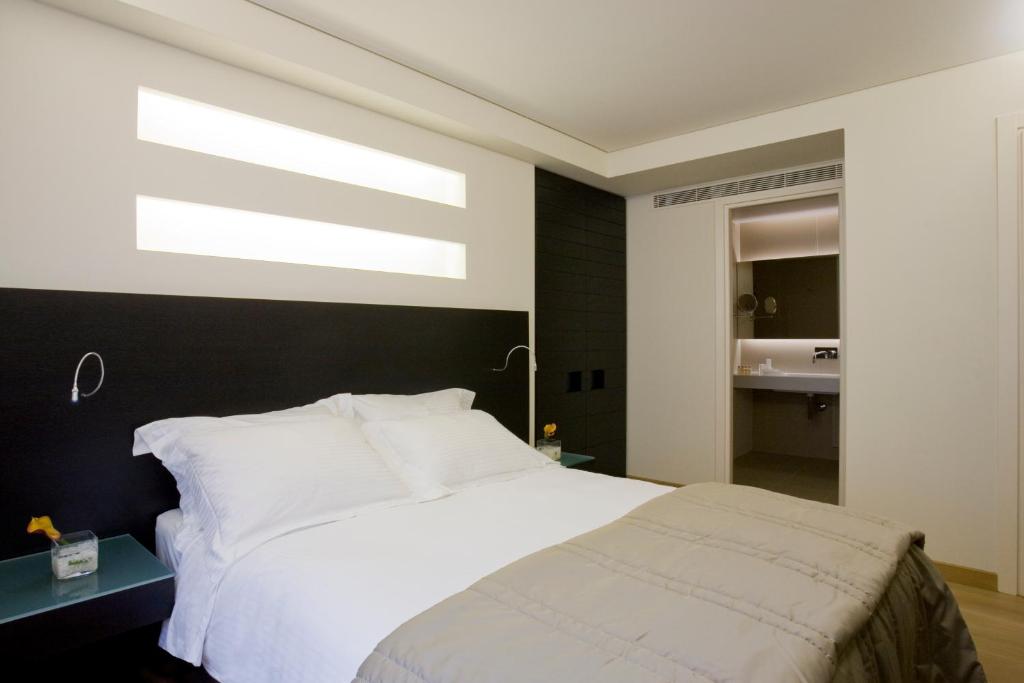 Posteľ alebo postele v izbe v ubytovaní O&B Athens Boutique Hotel