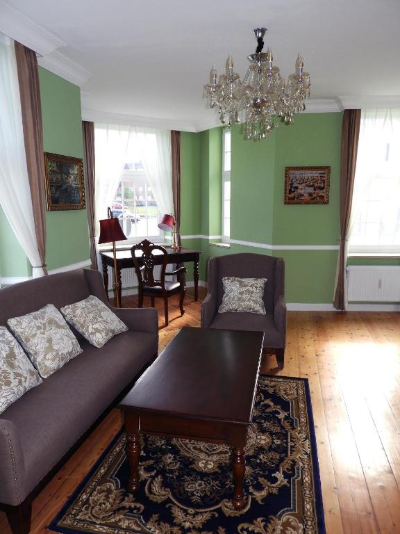 Posezení v ubytování Hotel Villa Schneverdingen
