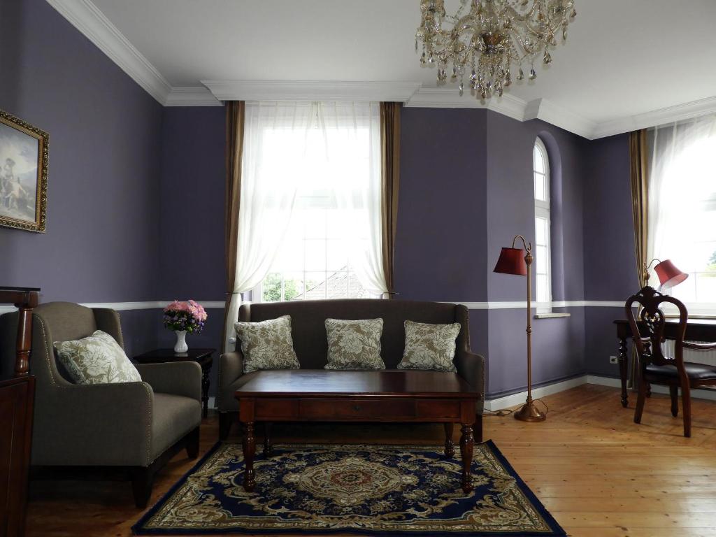 Posezení v ubytování Hotel Villa Schneverdingen
