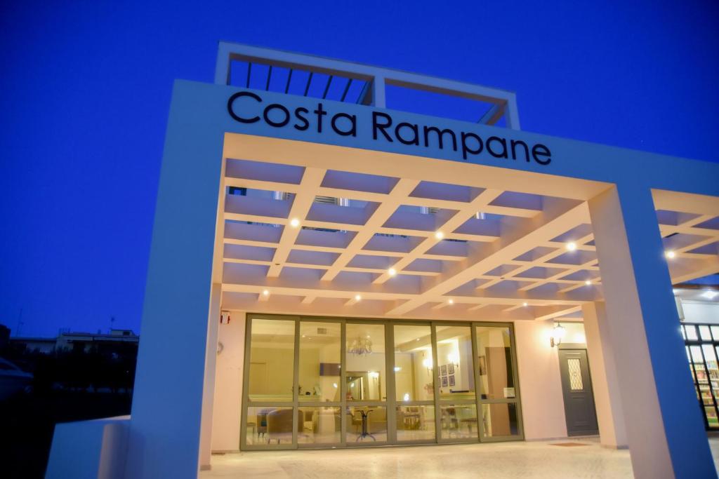 a building with a cosa rotunda with the name of costa ramm at Costa Rampane in Plitra