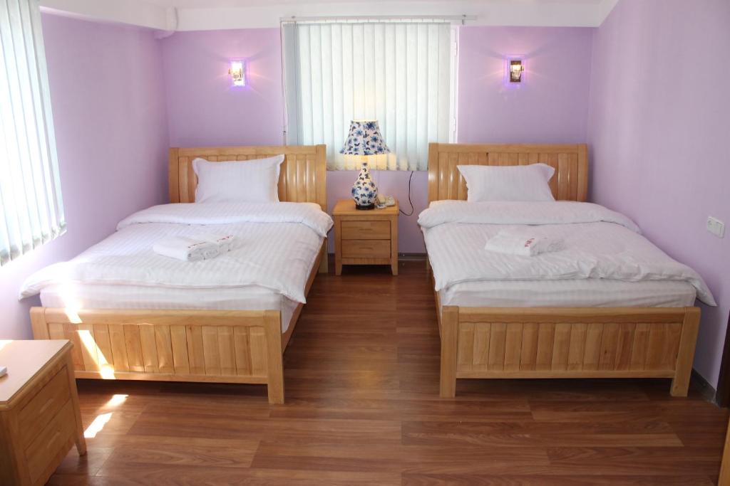 Postel nebo postele na pokoji v ubytování Hotel For You