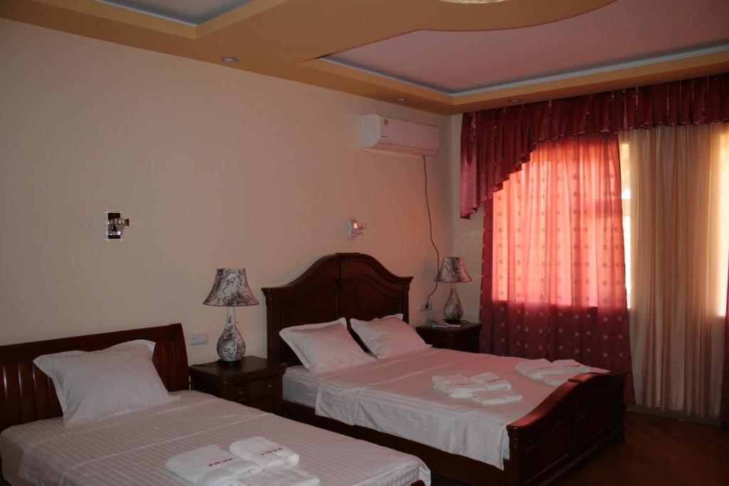 Postel nebo postele na pokoji v ubytování Hotel For You