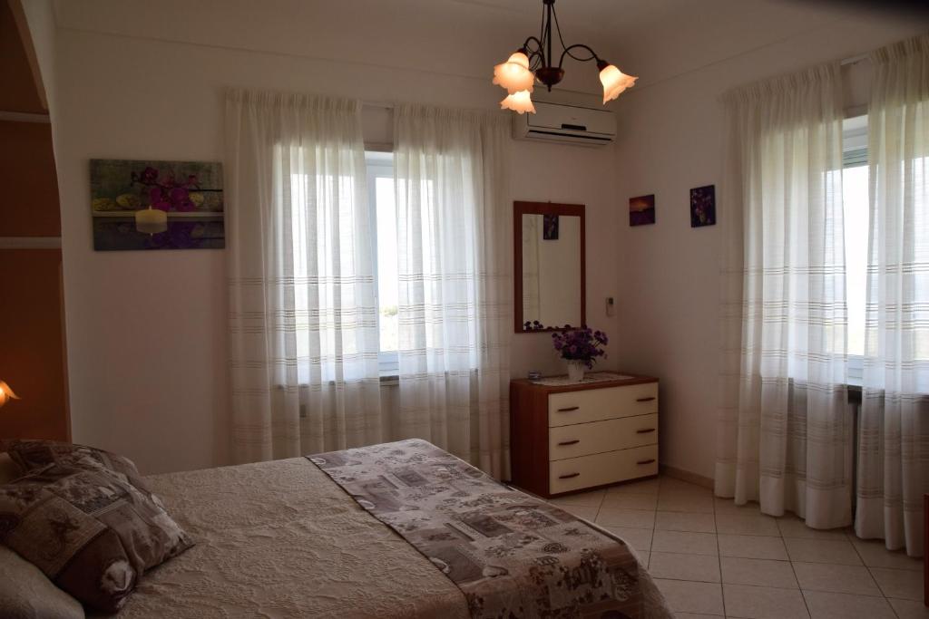Łóżko lub łóżka w pokoju w obiekcie villa damecuta B&B