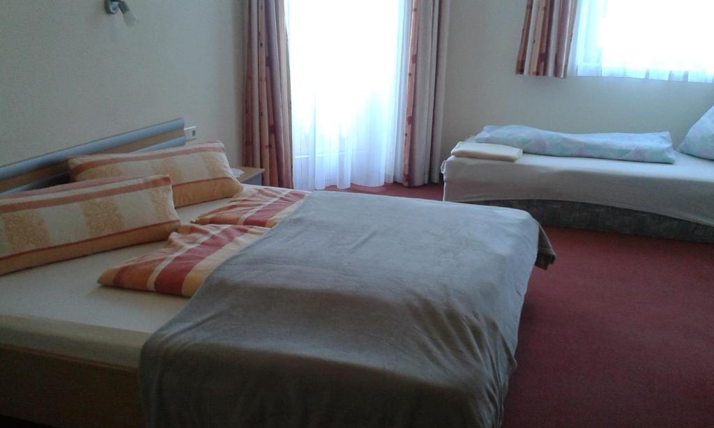 Postel nebo postele na pokoji v ubytování Ranerhof