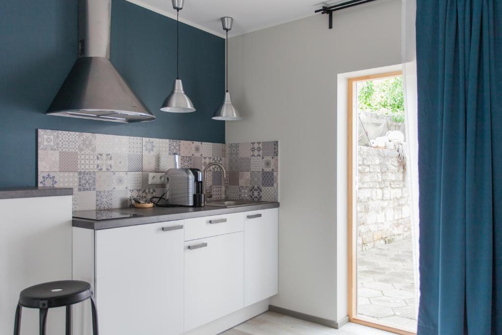 Kuchyň nebo kuchyňský kout v ubytování Johan Suites & Spa