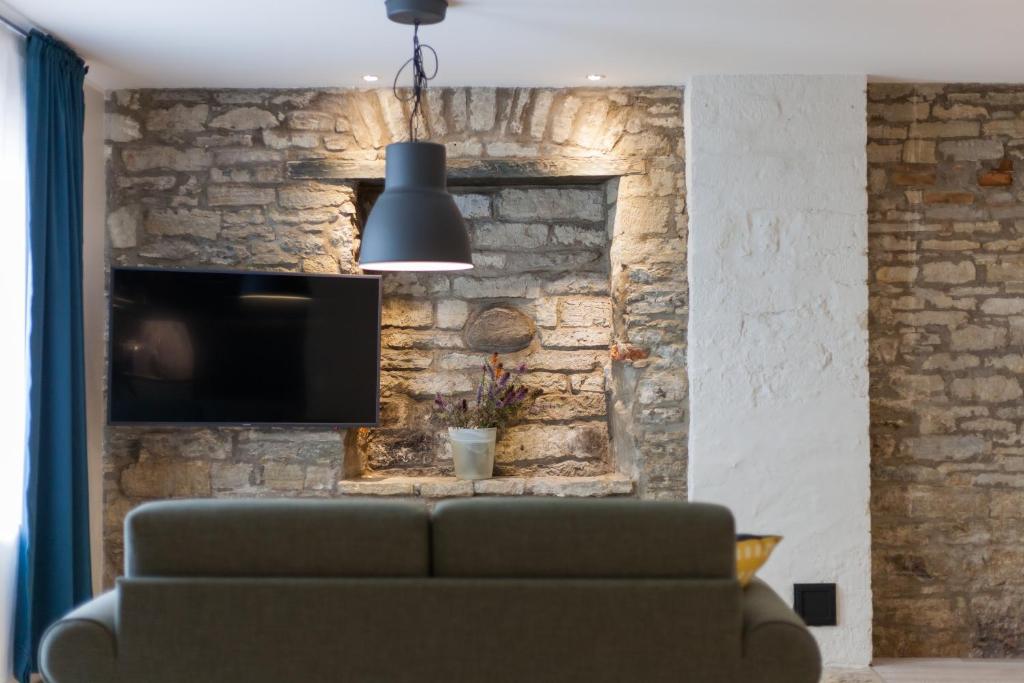 TV a/nebo společenská místnost v ubytování Johan Suites & Spa