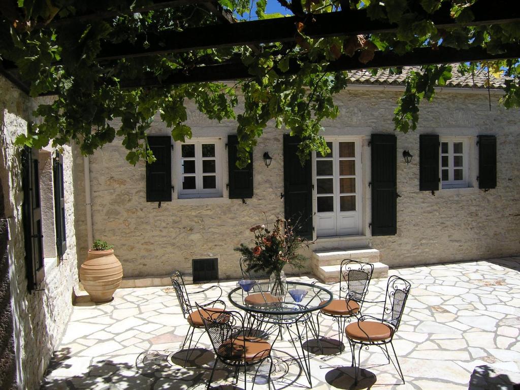 A patio or other outdoor area at Traditional Stone Villa Olympia