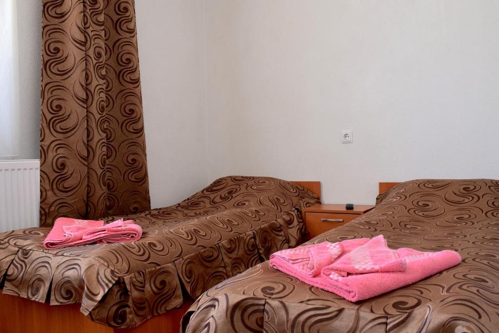 Postel nebo postele na pokoji v ubytování Complex Pele