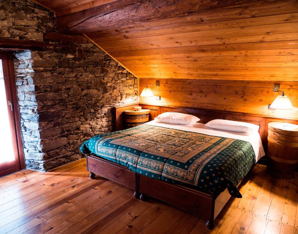Postel nebo postele na pokoji v ubytování Albergo Montagna Di Luce