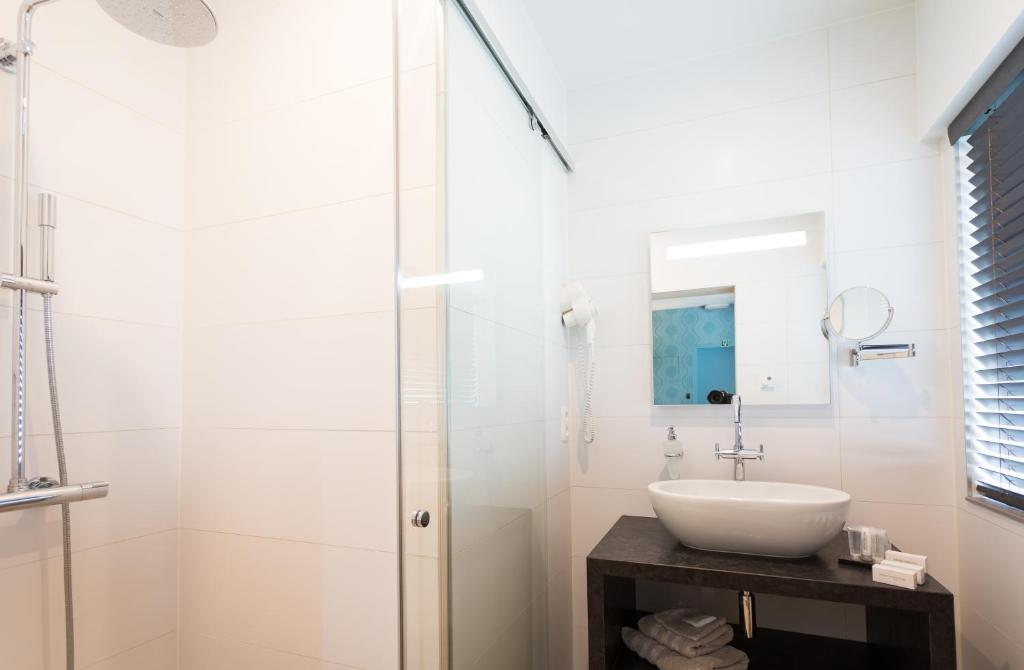Koupelna v ubytování Hotel Den Berg