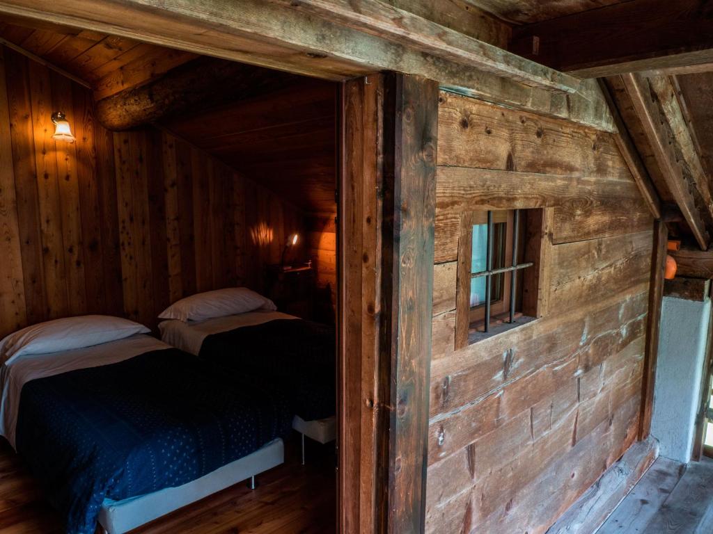 Postel nebo postele na pokoji v ubytování Albergo Montagna Di Luce