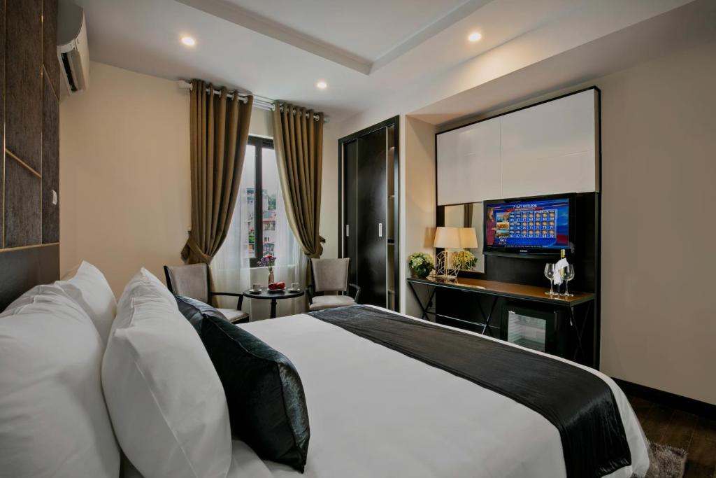 TV a/nebo společenská místnost v ubytování La Santé Hotel & Spa