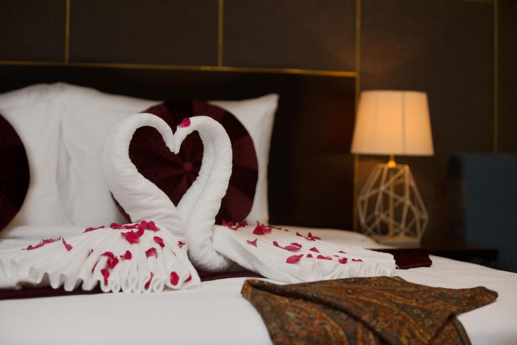 Postel nebo postele na pokoji v ubytování La Santé Hotel & Spa
