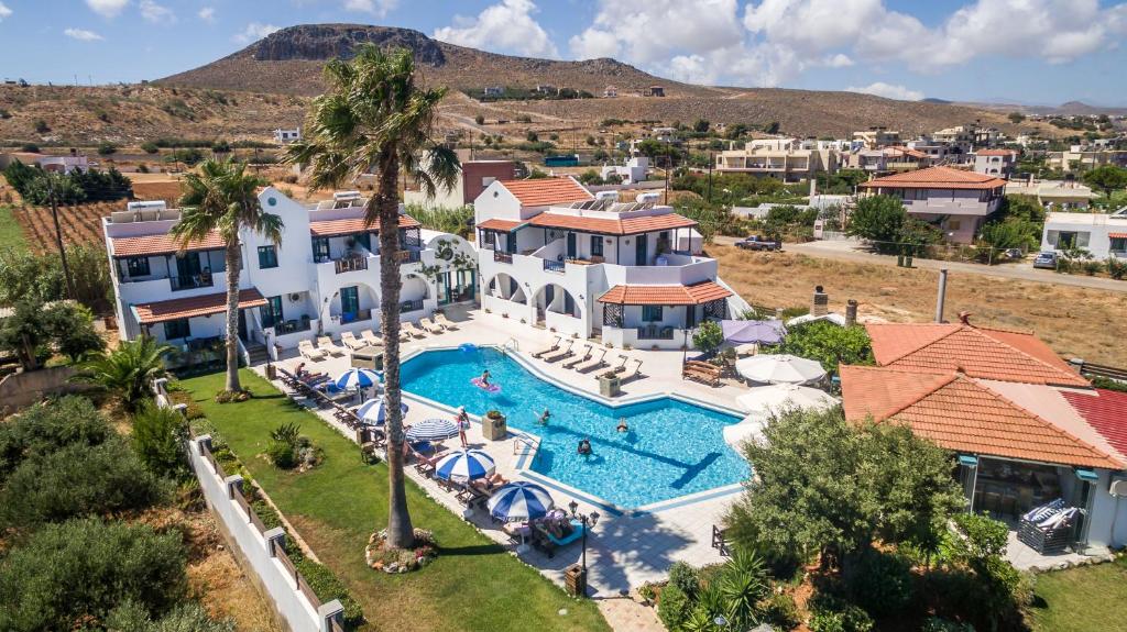 an aerial view of a house with a swimming pool at Villa Chantaloukas in Kokkini Khanion