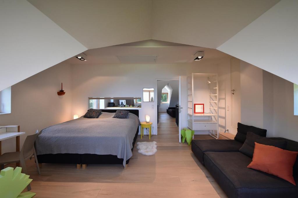 
Ein Bett oder Betten in einem Zimmer der Unterkunft Refugium Phönixberg
