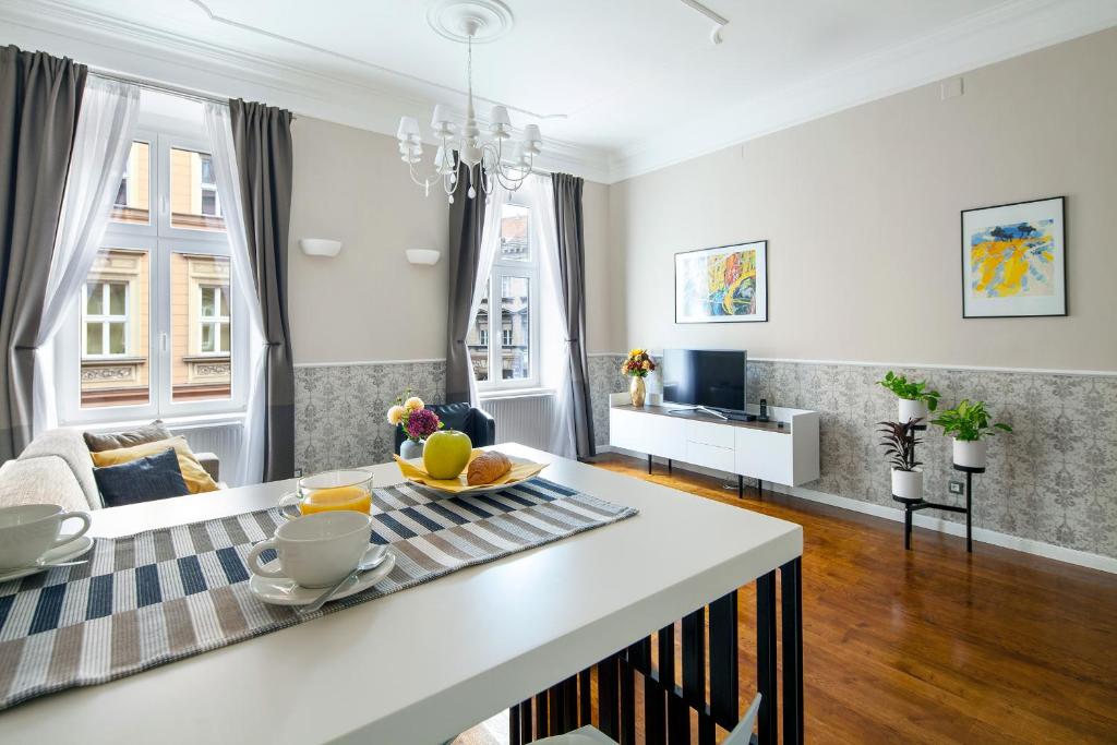 Televízia a/alebo spoločenská miestnosť v ubytovaní Markiz Luxury Apartments