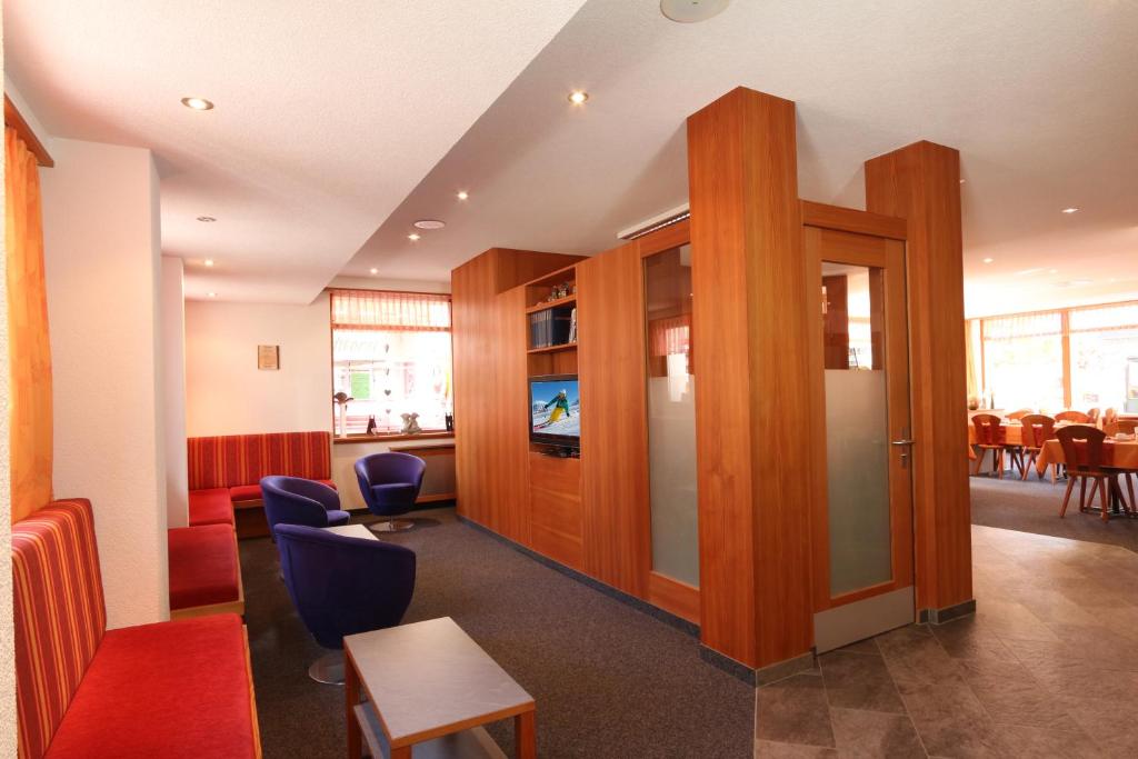 Posezení v ubytování Hotel Garni Domino