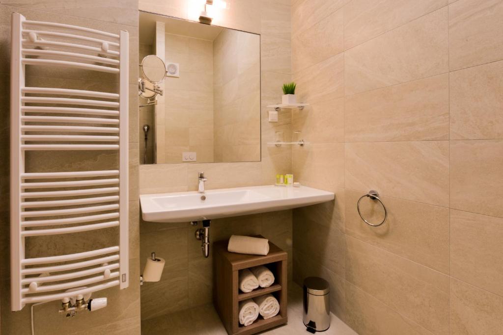 Koupelna v ubytování Grid Hotel