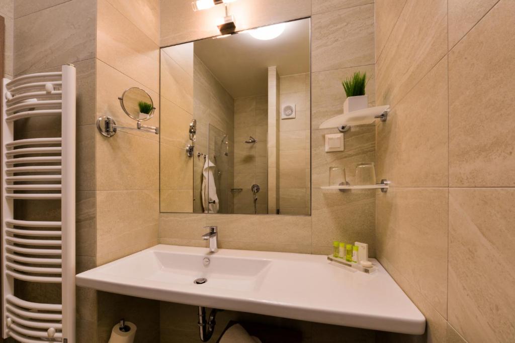 Koupelna v ubytování Grid Hotel