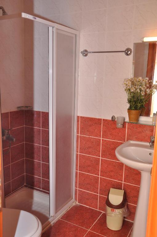 Koupelna v ubytování Latino Hotel