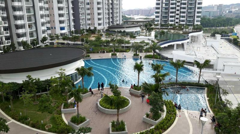 an aerial view of a swimming pool in a city at Wellsuits Putrajaya in Putrajaya