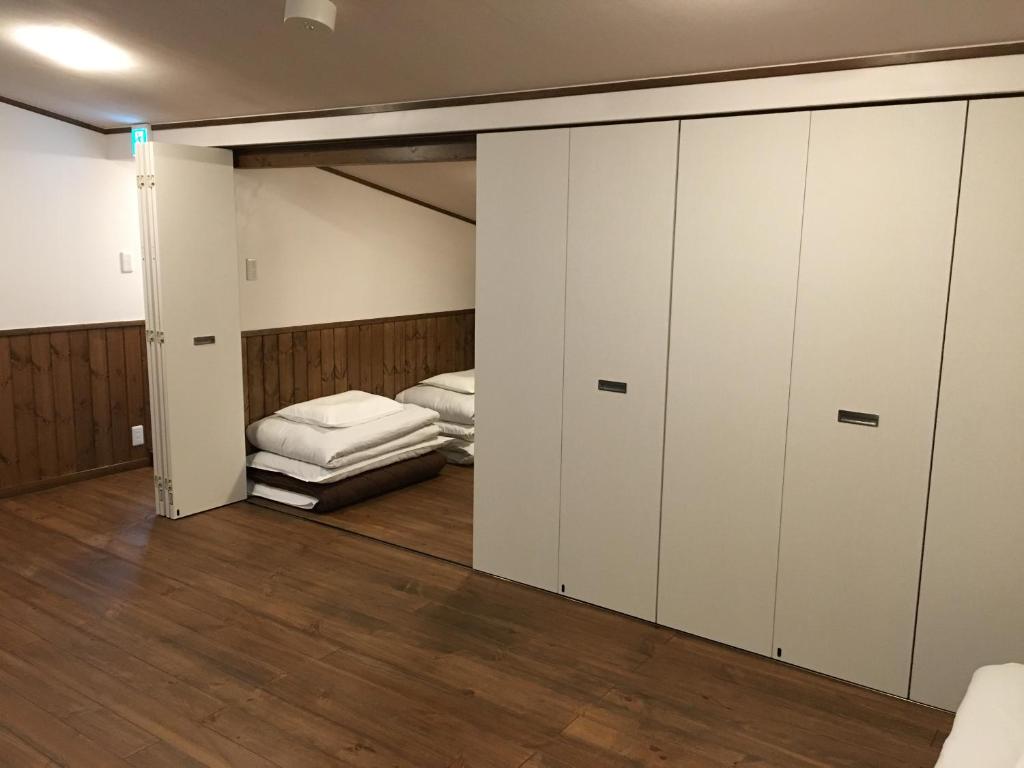 Postel nebo postele na pokoji v ubytování Villa Orange Cabin