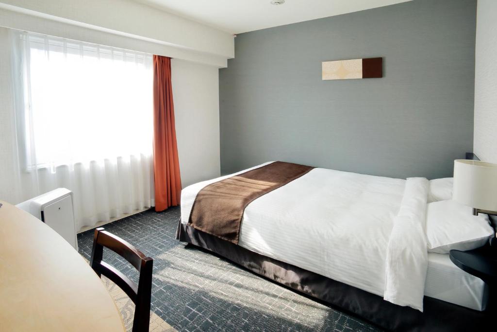 Sapporo Tokyu REI Hotel - Chambre Double Avec Petit Lit Double - Fumeurs