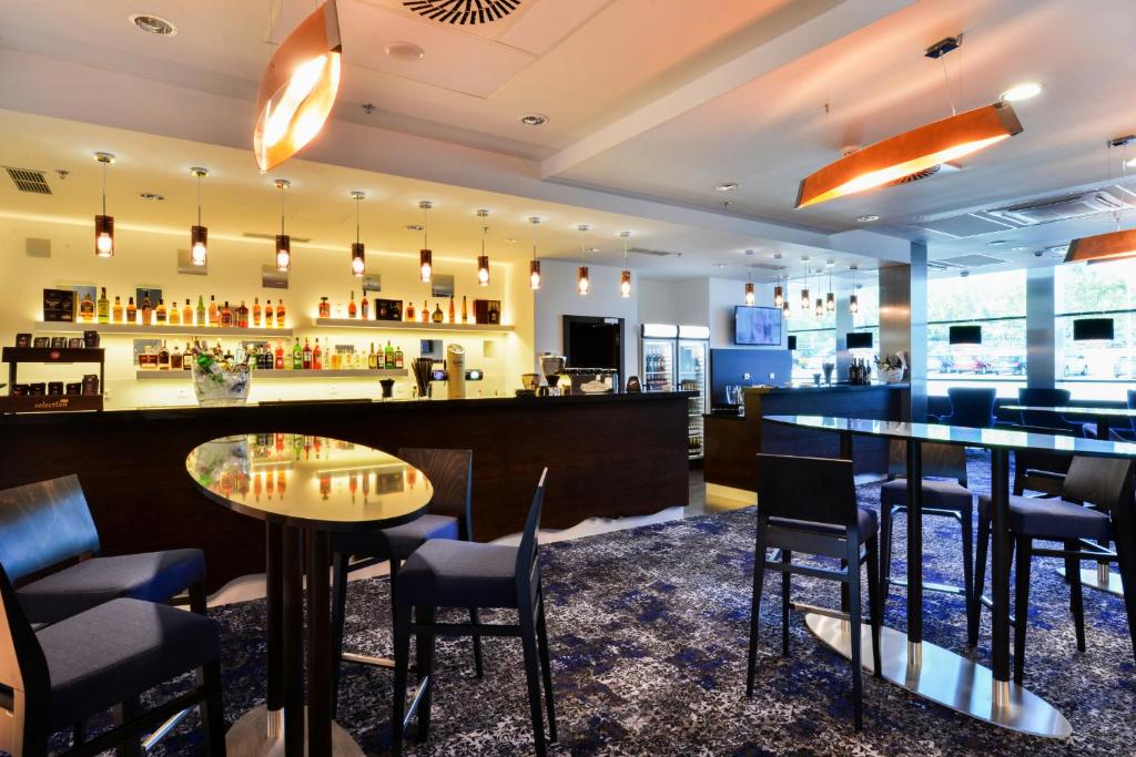 Lounge nebo bar v ubytování Grid Hotel