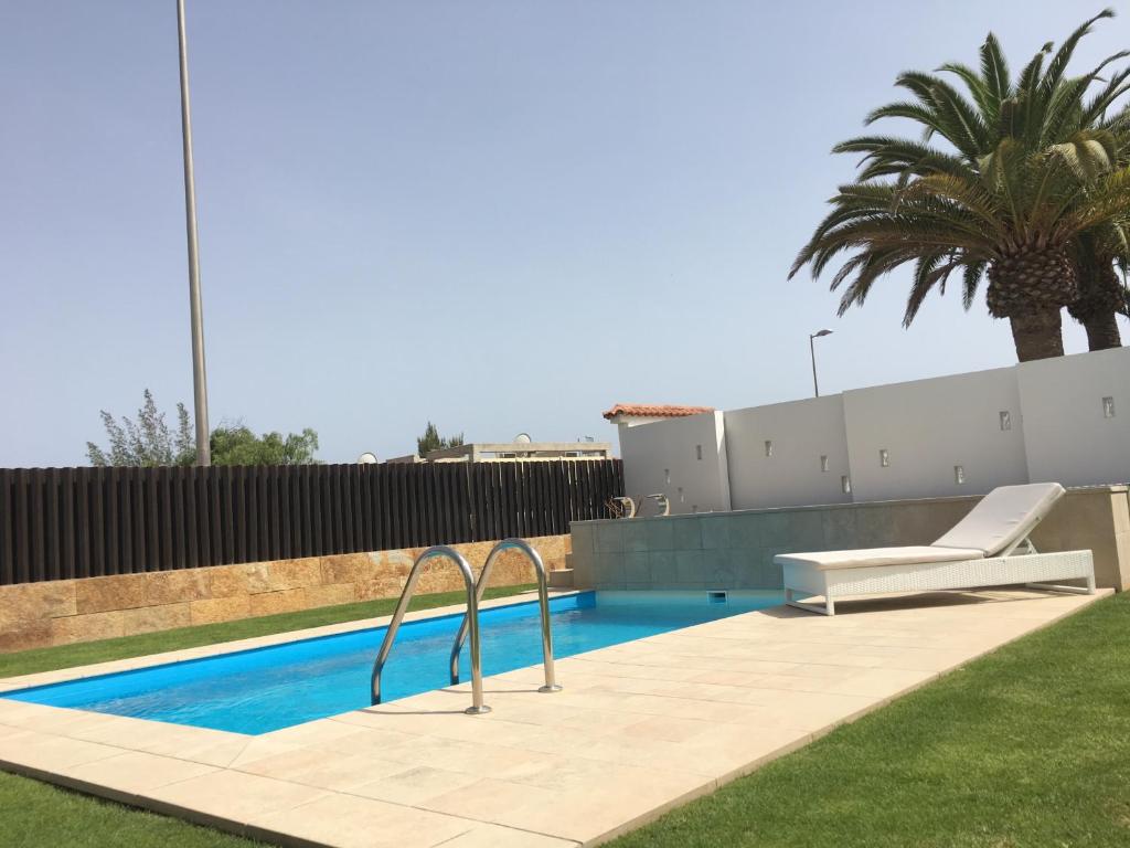 Bazén v ubytování Villa Calma Luxury Villa nebo v jeho okolí