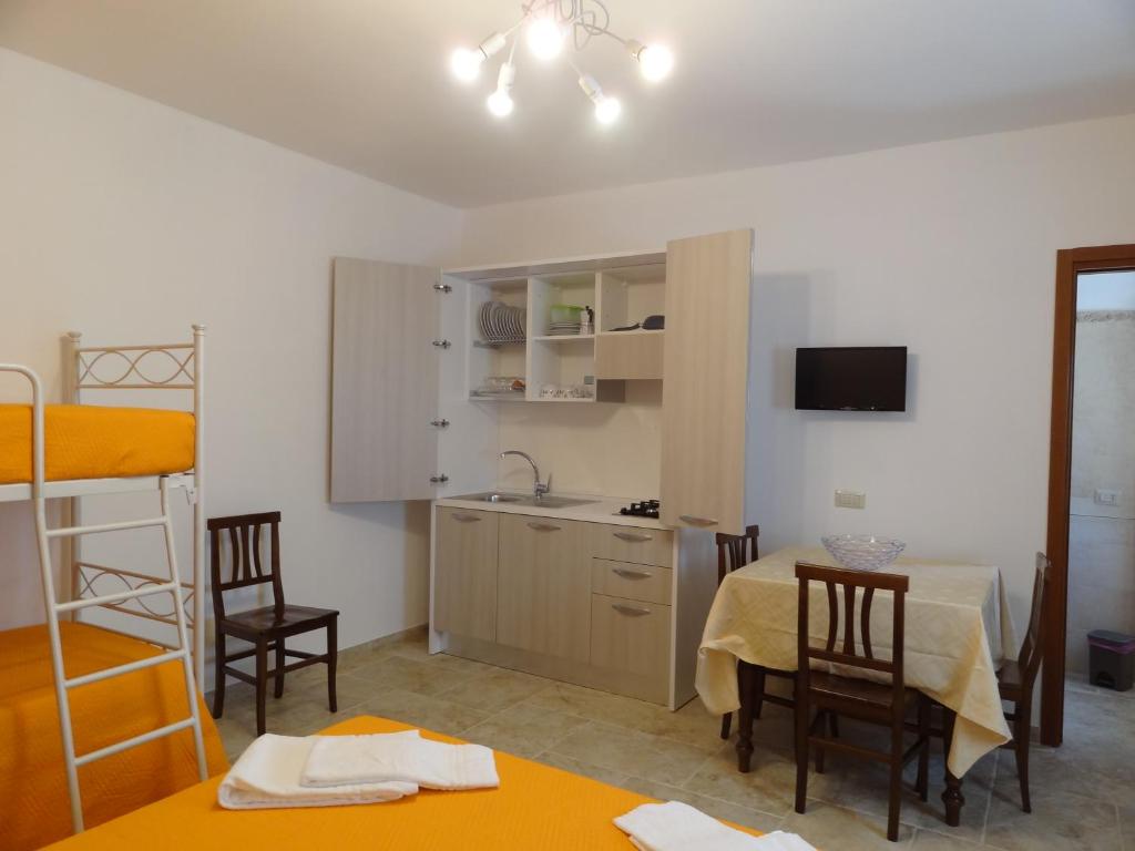 Kuchyň nebo kuchyňský kout v ubytování Trulli la macchia