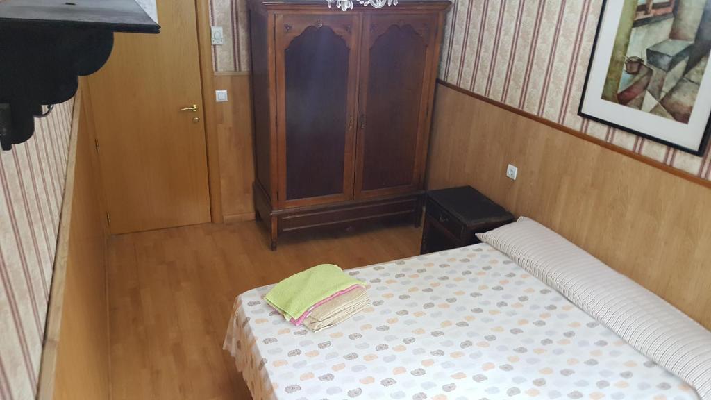 Postel nebo postele na pokoji v ubytování Pensión Villanueva