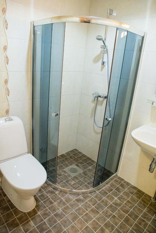 Koupelna v ubytování Ankur Hotell