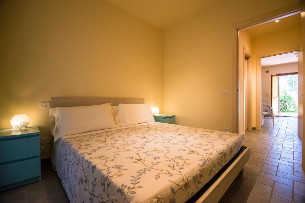 Łóżko lub łóżka w pokoju w obiekcie Appartamenti e Affittacamere Le Due Ruote