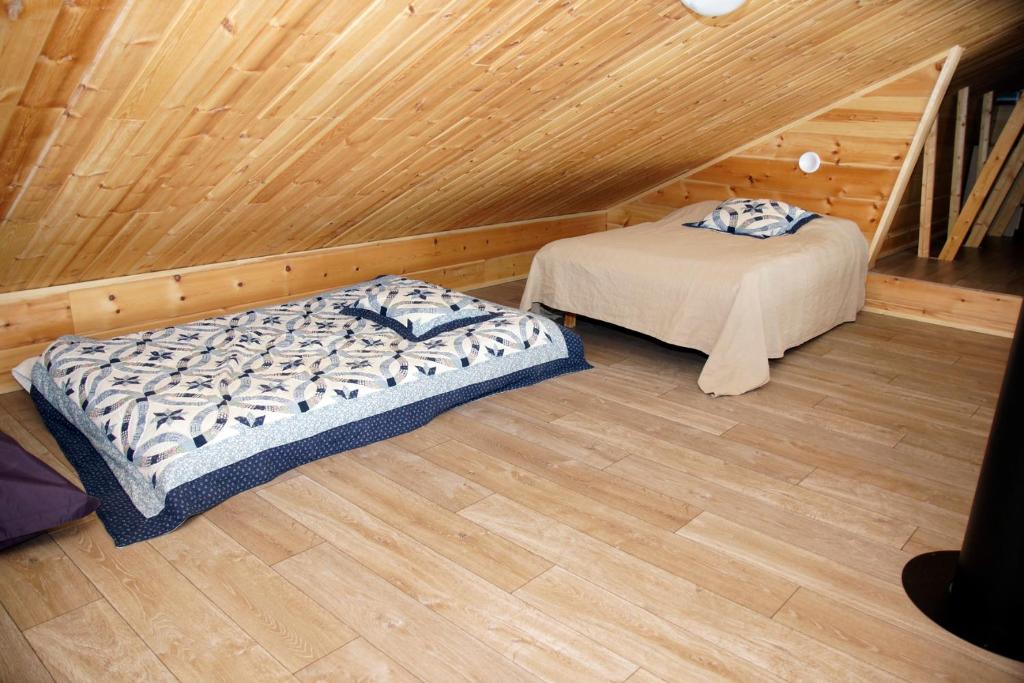 Кровать или кровати в номере Villa Kuukkeli