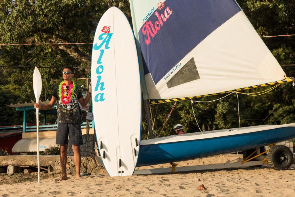  ALOHA em frente a praia- Suítes privativas & hostel