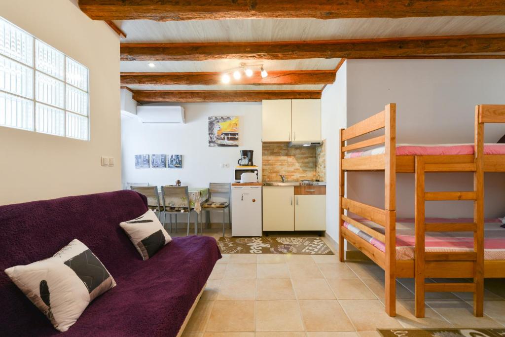 Kuchyňa alebo kuchynka v ubytovaní Studios Villa Romantica