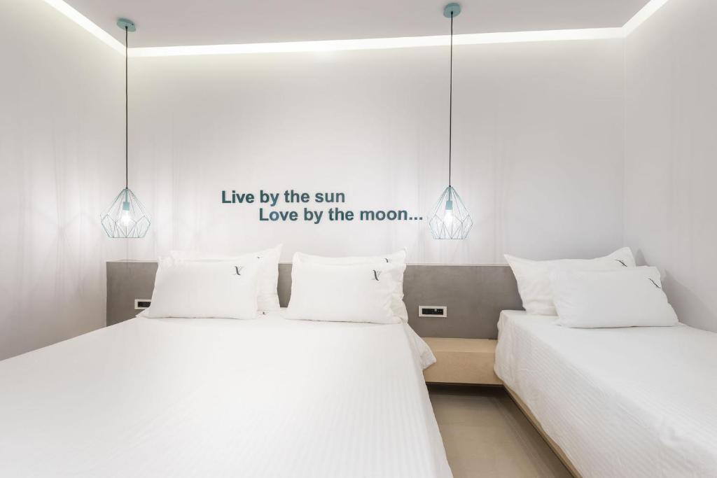 Postel nebo postele na pokoji v ubytování Venus Resort